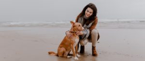 Girl with Dog at the Beach