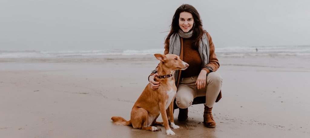 Girl with Dog at Beach